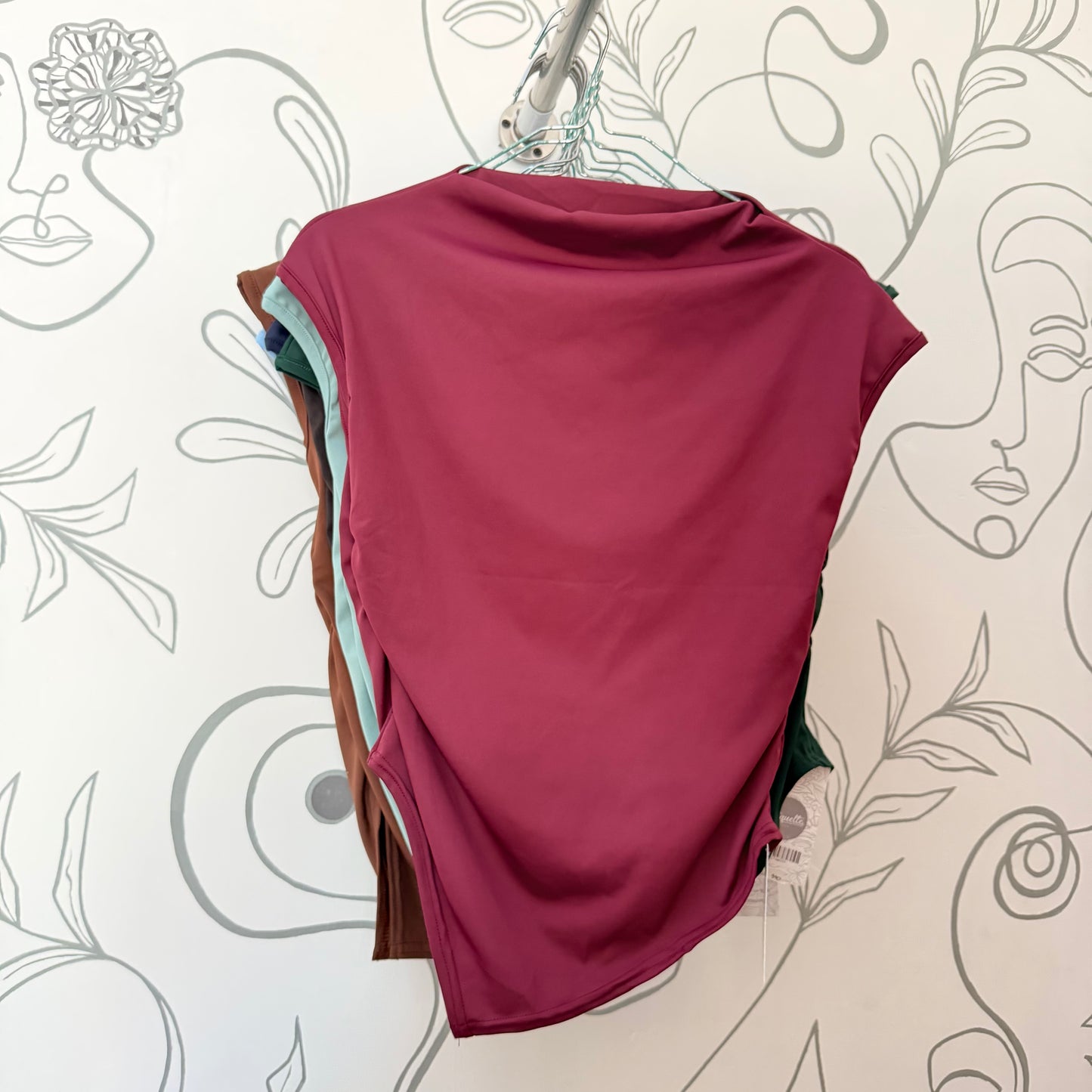 Blusa cuello alto cadete irregular
