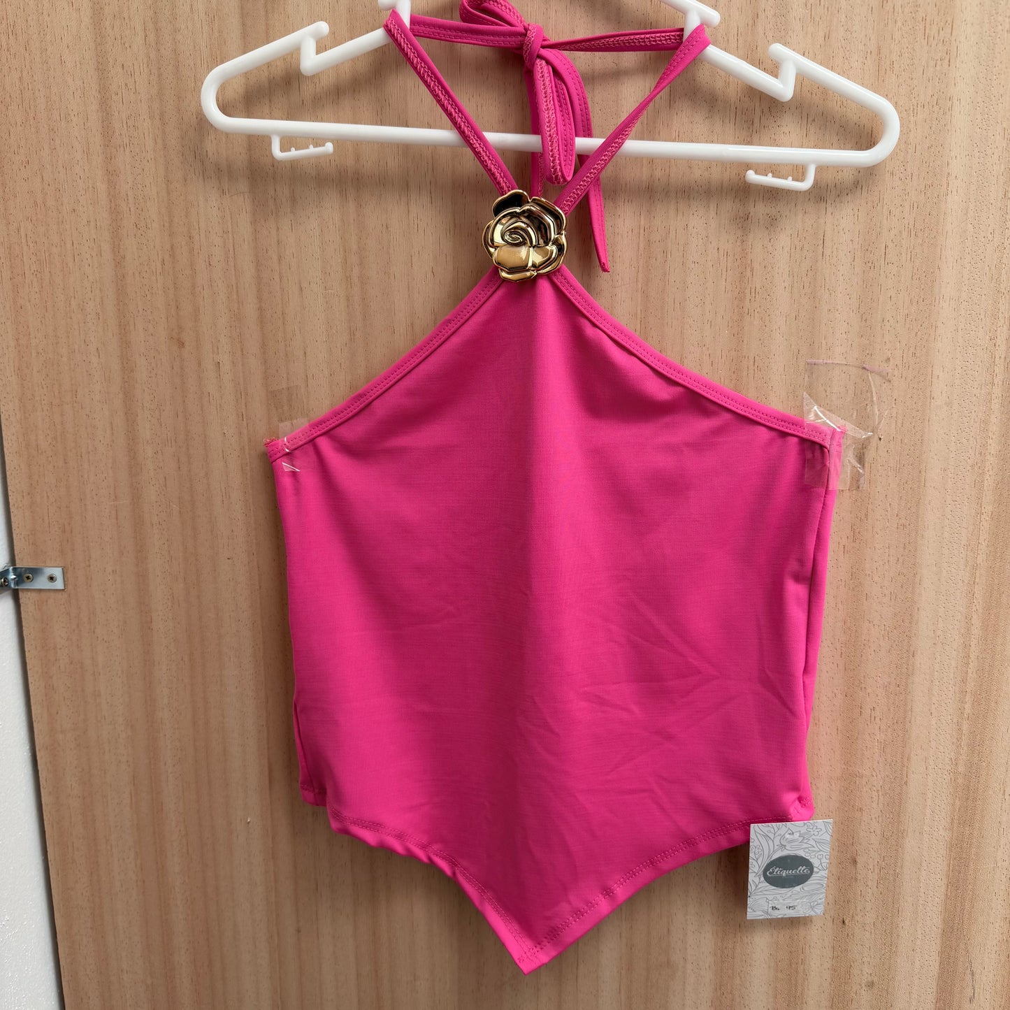 Top halter flor dorada